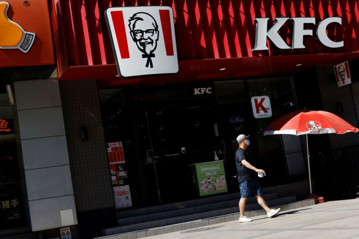 A man walks past a KFC restaurant after the city banned dine-in services amid the coronavirus disease (COVID-19) outbreak in Beijing, China May 30, 2022.