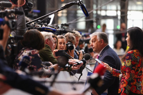 Hungary's Prime Minister Viktor Orban listens to a media question as he arrives for the European Union leaders summit, as EU's leaders attempt to agree on Russian oil sanctions in response to Russia's invasion of Ukraine, in Brussels, Belgium May 30, 2022