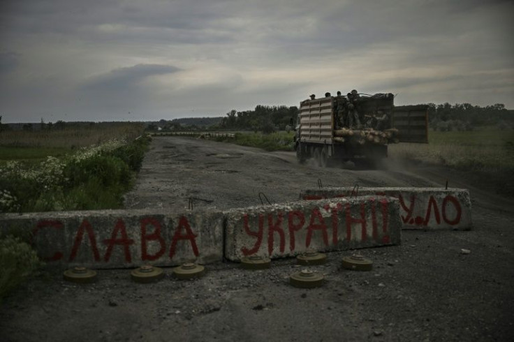 Ukrainian forces have fortified some towns' defences with land mines that they can stretch across a road in case of a Russian advance