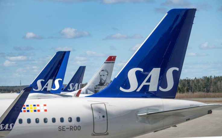 Scandinavian Airlines (SAS) planes are pictured at the Arlanda airport, north of Stockholm, Sweden April 9, 2020. Anders Wiklund/TT News Agency/via REUTERS