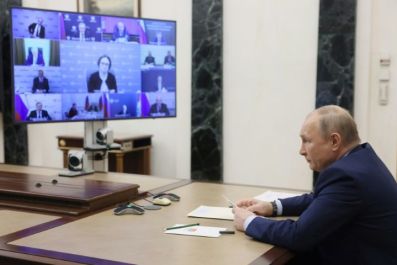 Russian President Vladimir Putin, pictured chairing a meeting on the oil industry, has been targeted by sanctions