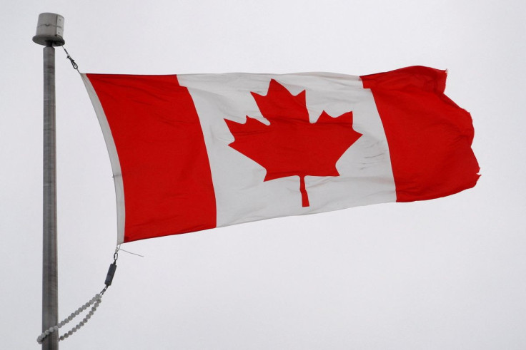 The Canadian flag flutters in the wind in Quebec City, February 26, 2010. 