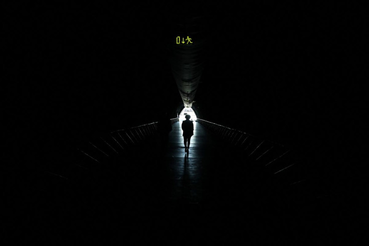 A person walks in a tunnel exiting Santa Park near Rovaniemi, Finland, May 24, 2022.