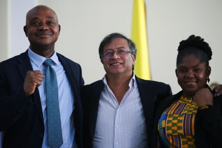 Luis Gilberto Murillo, former vice-presidential candidate for the Coalition of Hope, Colombian left-wing presidential candidate Gustavo Petro and vice-presidential candidate Francia Marquez of the Historic Pact coalition pose for a photo at the Congress o