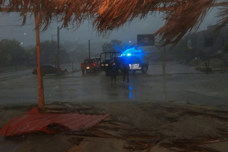 Hurricane Agatha, the first of the season, dumped heavy rain on coastal resorts including Huatulco in southwest Mexico