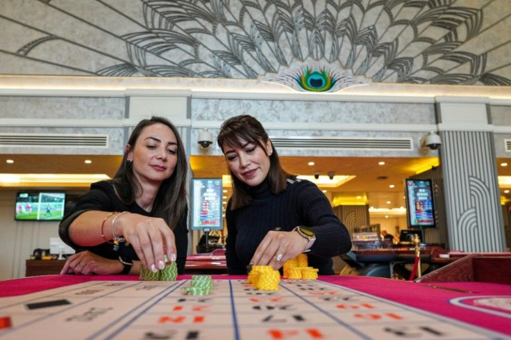 Raise you one: Employees at the Colony Hotel casino in Kyrenia in  Turkish-controlled northern Cyprus