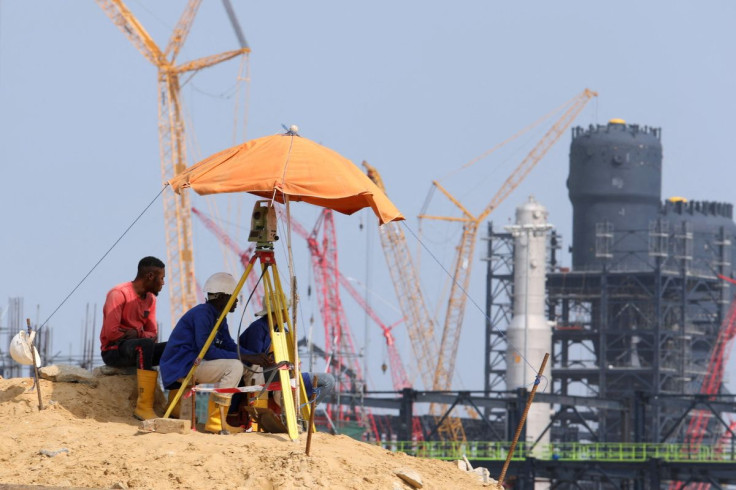 Workers sit at a construction site of the Dangote Refinery in Ibeju Lekki district, on the outskirts of Lagos, Nigeria August 7, 2019.