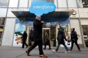 People pass by the Salesforce Tower and Salesforce.com offices in New York City, U.S., March 7, 2019. 