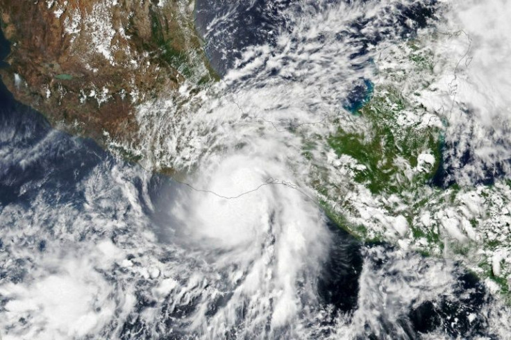 A satellite image released by the NASA Earth Observatory shows Hurricane Agatha over Mexico's Pacific coast