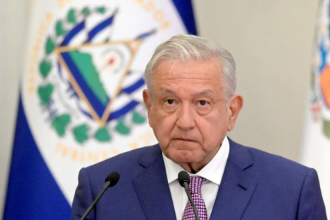 The United States says it is eager for Mexican President Andres Manuel Lopez Obrador, seen on a May 2022 visit to El Salvador, to attend the Summit of the Americas in Los Angeles