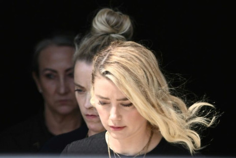 US actress Amber Heard departs the Fairfax County Circuit Courthouse in Fairfax, Virginia, after losing her defamation case against ex-husband Johnny Depp on June 1, 2022