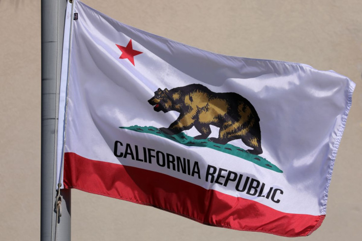 The state flag of California flies on a flag pole in San Diego, California, U.S., October 6, 2017.       