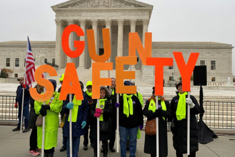 A group among hundreds of supporters of gun control laws rally in front of the US Supreme Court as the justices hear the first major gun rights case since 2010, in Washington, U.S. December 2, 2019. 