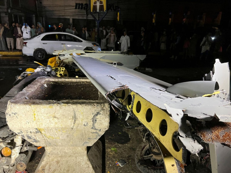 The wreckage of a drone aircraft is seen on a street in Sanaa, Yemen May 23, 2022.