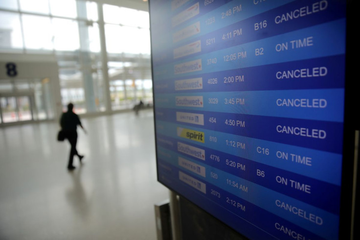 Canceled flights are seen on an airport screen in New Orleans, Louisiana U.S., April 4, 2020. 