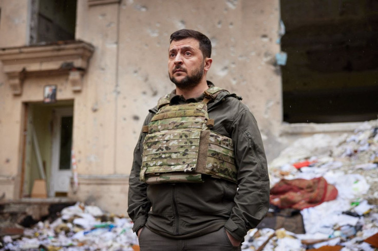 Ukraine's President Volodymyr Zelenskiy visits an area damaged by Russian military strikes, as Russia's attack on Ukraine continues, in Kharkiv, Ukraine May 29, 2022.  Ukrainian Presidential Press Service/Handout via REUTERS 