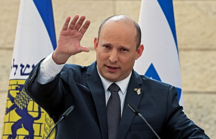 Israeli Prime Minister Naftali Bennett delivers a speech during the annual Yom Hazikaron Remembrance Day ceremony for fallen Israeli soldiers, in the Yad LaBanim Memorial in Jerusalem May 3, 2022. Menahem KAHANA /Pool via REUTERS