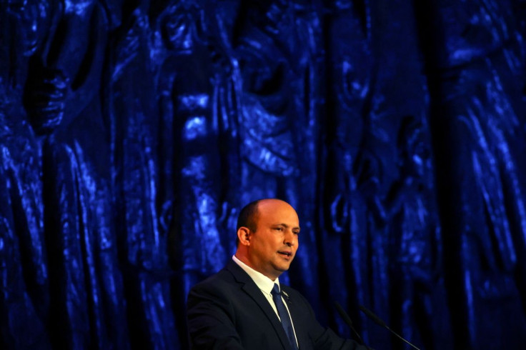 Israeli Prime Minister Naftali Bennett speaks at the Holocaust Martyrs' and Heroes Remembrance Day opening ceremony in memory of the six million Jewish men, women and children murdered by the Nazis and their collaborators, at Yad Vashem Holocaust Museum i
