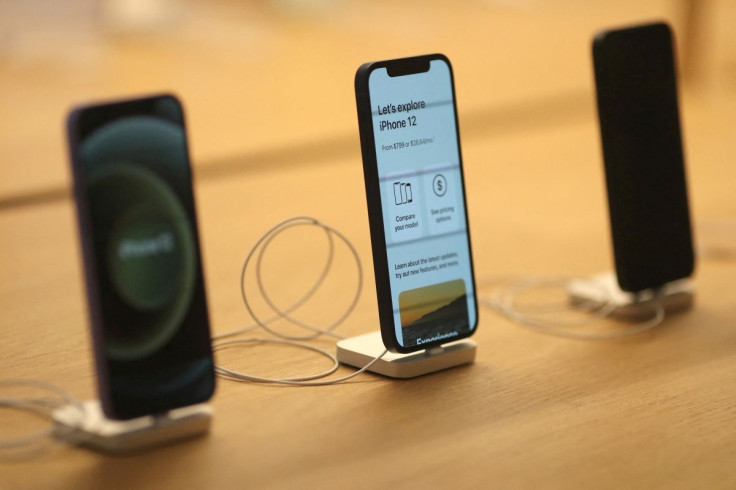 IPhone 12 phones are seen at the new Apple Store on Broadway in downtown Los Angeles, California, U.S., June 24, 2021. 