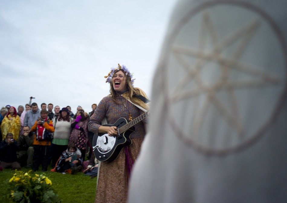 Chants and Incantations Summer Solstice 2011 celebrated by druids at Stonehenge.