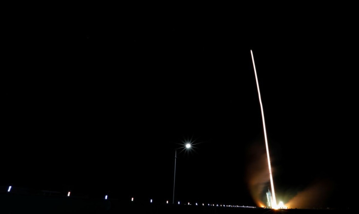 The Long March-2F Y13 rocket, carrying the Shenzhou-13 spacecraft and three astronauts in China's second crewed mission to build its own space station, launches at Jiuquan Satellite Launch Center near Jiuquan, Gansu province, China October 16, 2021.