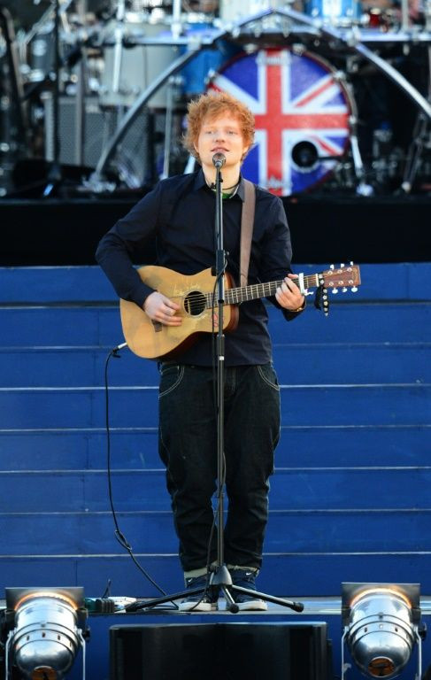 Singer-songwriter Ed Sheeran rounds off a people's parade on Sunday