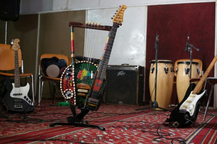 Noureddine Jaber plays a unique 'tambo-guitar', an instrument he fashioned from a guitar neck and his father's vintage tamboura