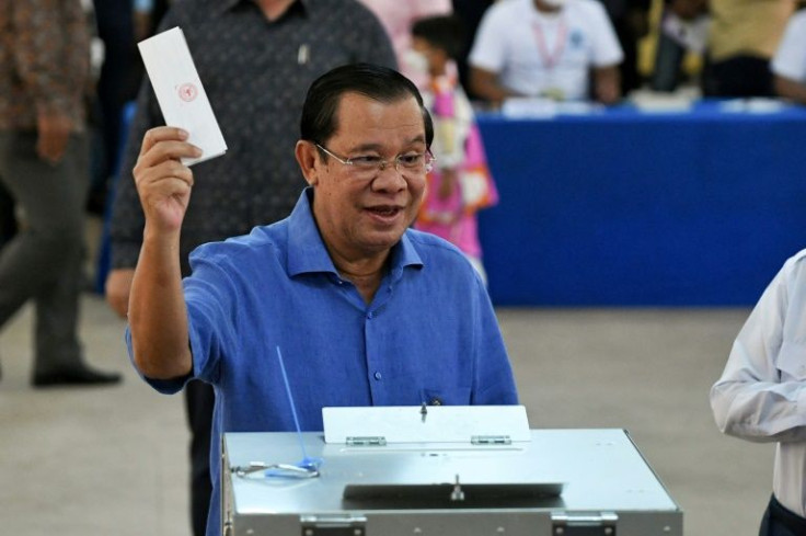 All eyes are on whether the opposition can put a dent in Prime Minister Hun Sen's hold on power as Cambodians head to the polls