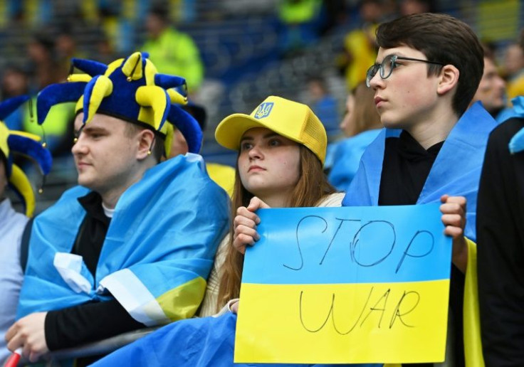 Ukraine supporters held up anti-war banners during Sunday's 1-0 defeat to Wales