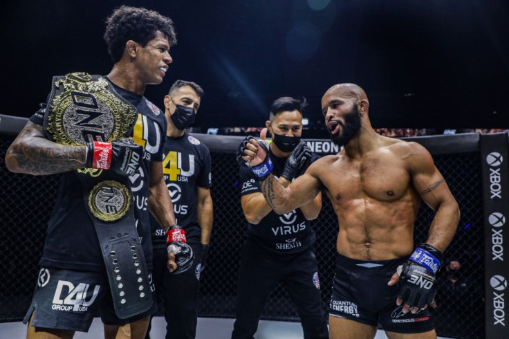 Adriano Moraes (L) and Demetrious Johnson (R)