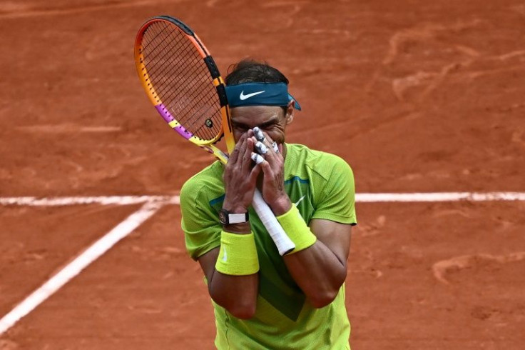 Victory: Rafael Nadal, 36, routed Casper Ruud 6-3, 6-3, 6-0 in Sunday's final at Roland Garros to extend his Grand Slam title record to 22, with victory coming 17 years to the day since he claimed his first French Open as a 19-year-old in 2005