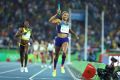 2016 Rio Olympics - Athletics - Final - Women's 4 x 400m Relay Final - Olympic Stadium - Rio de Janeiro, Brazil - 20/08/2016. Allyson Felix (USA) of USA celebrates as team USA win the gold. This win is Felix's sixth gold in track and field. 