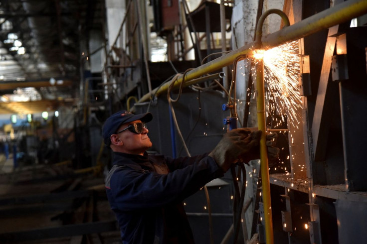 An employee prepares a facility for producing fire trucks, as the factory was relocated from Chernihiv region to Lviv amid Russia's invasion, in Lviv, Ukraine June 5, 2022.