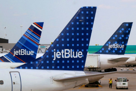 JetBlue Airways aircraft are pictured at departure gates at John F. Kennedy International Airport in New York June 15, 2013. 