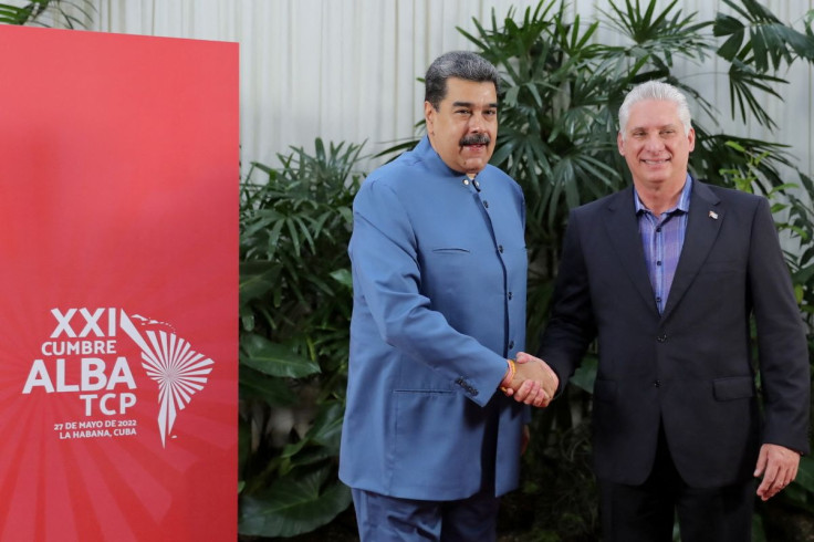 Venezuelan President Nicolas Maduro shakes hands with his Cuban counterpart Miguel Diaz-Canel during the ALBA group meeting in Havana, Cuba, May 27, 2022. Miraflores Palace/Handout via REUTERS 