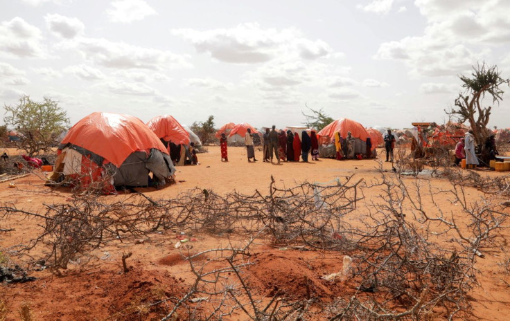 The graves of twin sisters Ebla and Abdia who died of hunger are seen at the Kaxareey camp for the internally displaced people in Dollow, Gedo region of Somalia May 24, 2022. Picture taken May 24, 2022.