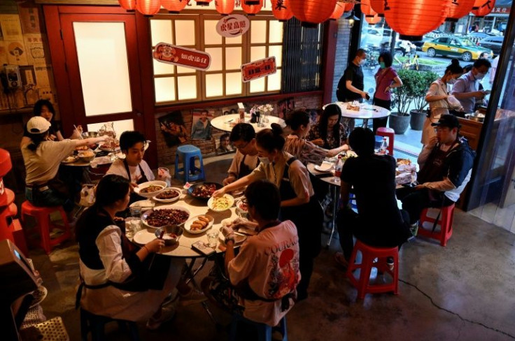 Some restrictions remain in Beijing, including a limit of 50 percent dine-in capacity for restaurants