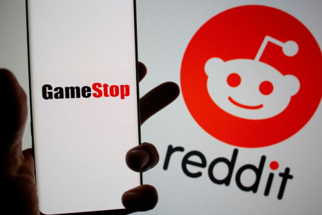 GameStop logo is seen in front of displayed Reddit logo in this illustration taken on Febr. 2, 2021. 