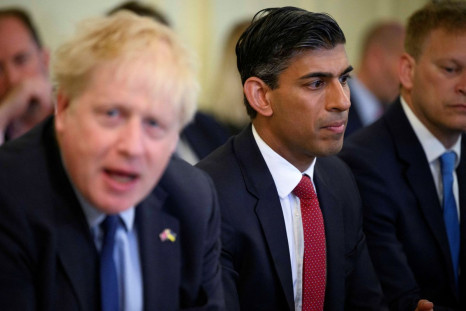 British Chancellor of the Exchequer Rishi Sunak listens as British Prime Minister Boris Johnson addresses his cabinet on the day of the weekly cabinet meeting in Downing Street, London, Britain June 7, 2022. Leon Neal/Pool via REUTERS