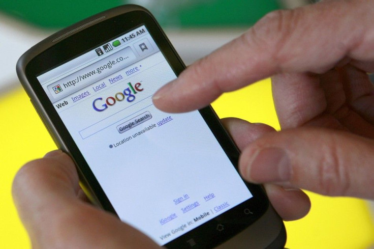A man searches on Google from his smartphone
