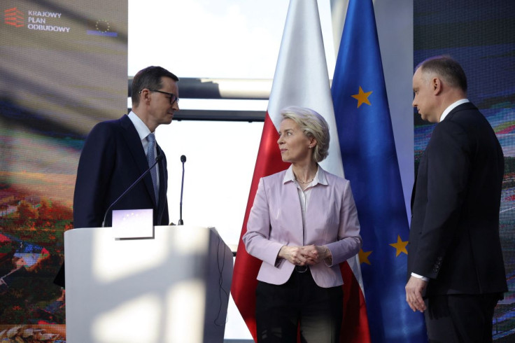 European Commission President Ursula von der Leyen looks over, next to Polish Prime Minister Mateusz Morawiecki and President Andrzej Duda at a news conference, during her visit to Poland to mark the acceptance of the country's National Recovery Plan, whi