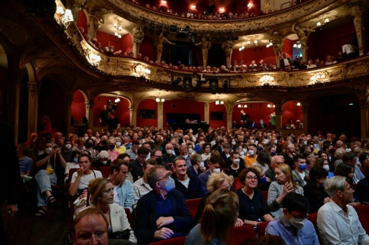 The interview with the former chancellor, who remains hugely popular in Germany, was held at the Berliner Ensemble theatre