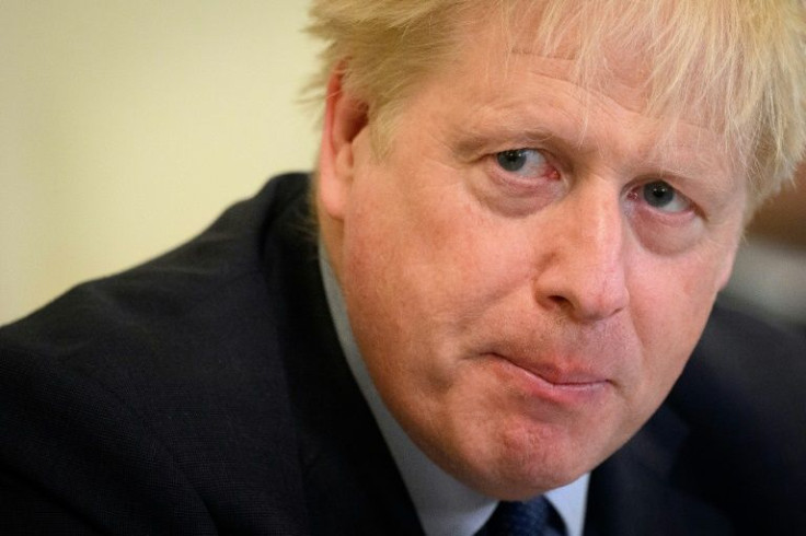 British Prime Minister Boris Johnson survived a vote of no confidence from his own Conservative MPs but with his position weakened after a sizeable number refused to back him