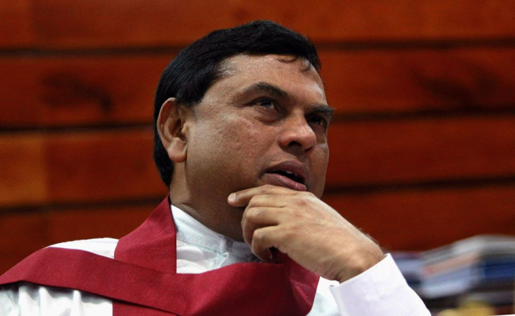 Sri Lankan President Gotabaya Rajapaksa's brother, Basil Rajapaksa, speaks during an interview with Reuters in Colombo April 10, 2012.