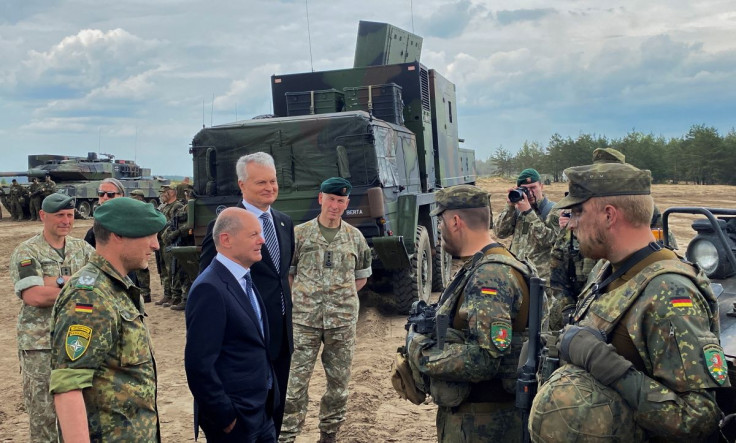 German Chancellor Olaf Scholz and Lithuanian President Gitanas Nauseda visit German troops of the NATO enhanced Forward Presence Battlegroup in Pabrade, Lithuania June 7, 2022. Picture taken June 7, 2022.