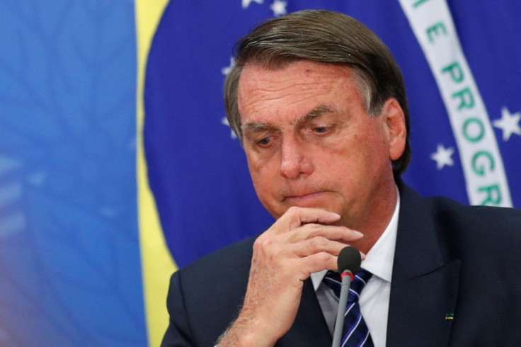 Brazil's President Jair Bolsonaro gestures as he attends a news conference at the Planalto Palace in Brasilia, Brazil June 6, 2022.