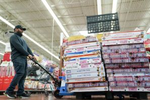 A Walmart employee stocks the toy section of Walmart on Black Friday, a day that kicks off the holiday shopping season, in King of Prussia, Pennsylvania, U.S., on November 29, 2019. 
