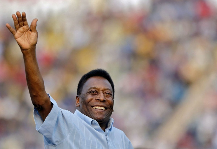 Legendary Brazilian soccer player Pele waves to the spectators before the start of under-17 boys' final soccer match of Subroto Cup tournament at Ambedkar stadium in New Delhi, India, October 16, 2015.