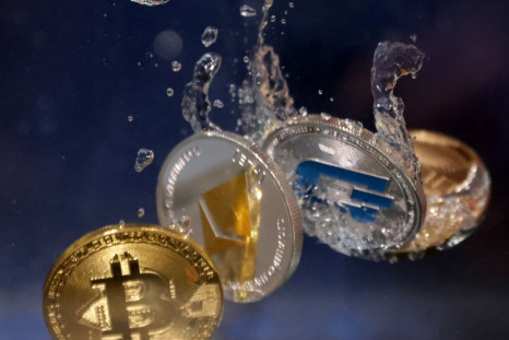 Representations of cryptocurrency Bitcoin, Ethereum and Dash plunge into water in this illustration taken, May 23, 2022. 
