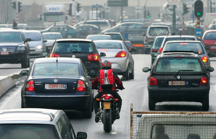 Cars drive along a road in central Brussels February 7, 2007.